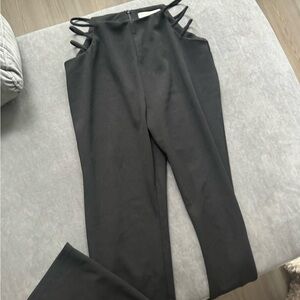 Black pants size M with cut outs on hips